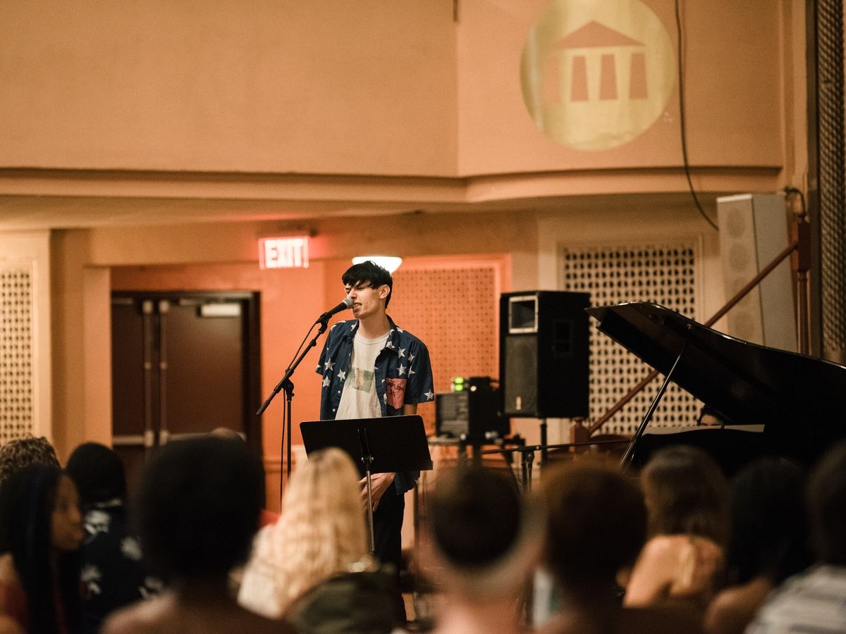 Students perform during Open Mic Night