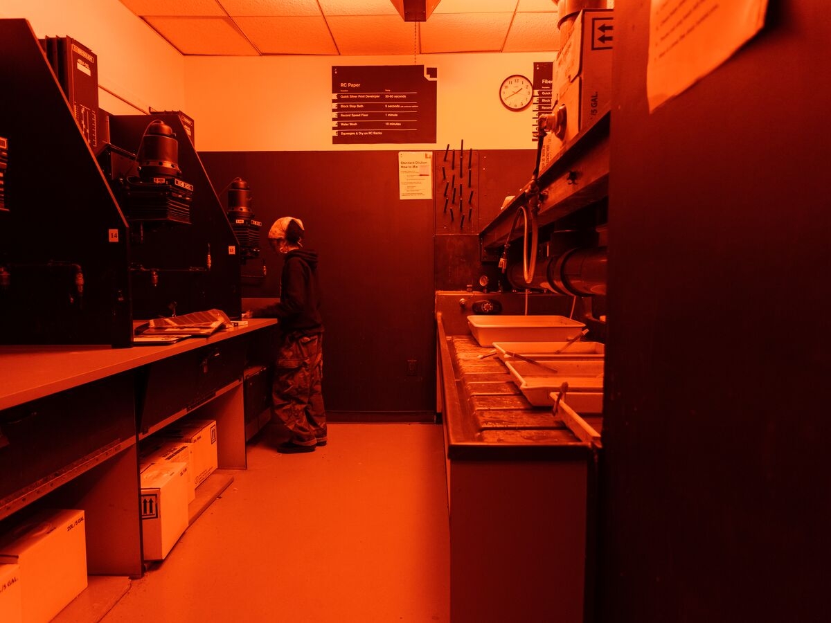 A student works on their film in the Darkroom