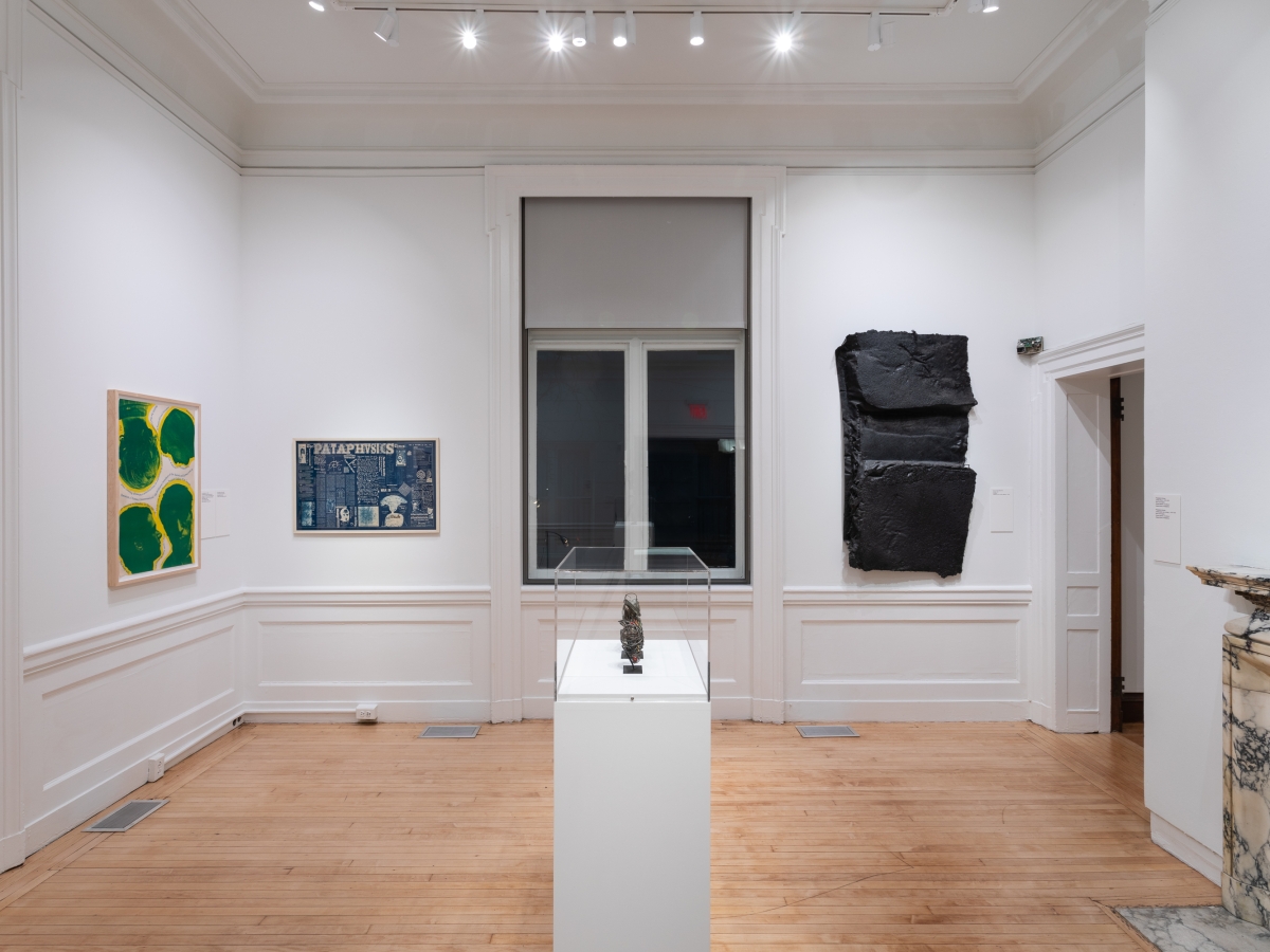 Invisible City exhibition, Gallery A; three works on the wall and one in a case in the center of the room