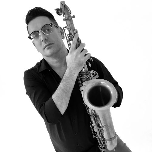 A black-and-white, slanted image of Chris Farr holding a sax.