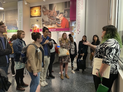Students listen to a museum professional at the Smithsonian National Museum of Natural History.