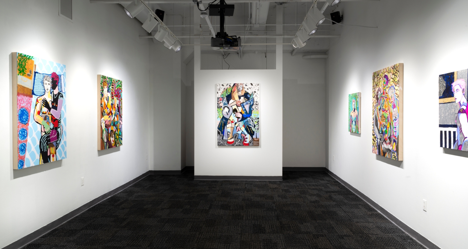 interior of the Fine Arts gallery geaturing high-contrast brightly colored works by Samuel Telup. the walls are stark white and the floor is a black carpeted texture. 