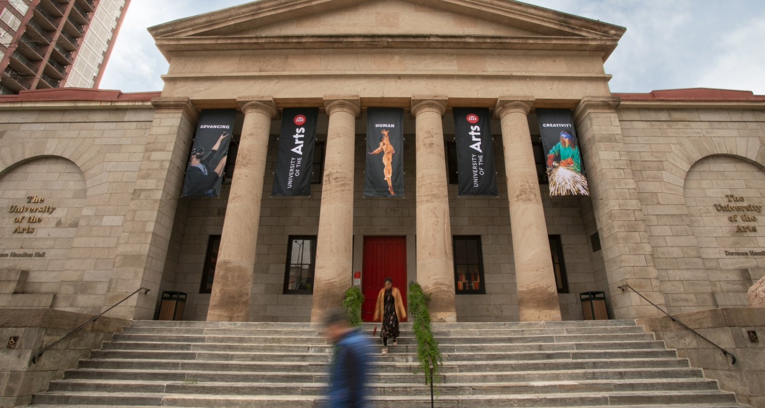 Hamilton Hall, an administrative building at UArts, decorated with banners that say, “Advancing Human Creativity.”