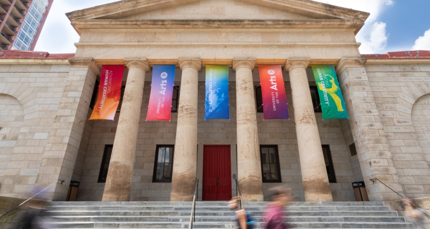 colorful banners hang between the columns of hamilton hall on south broad street