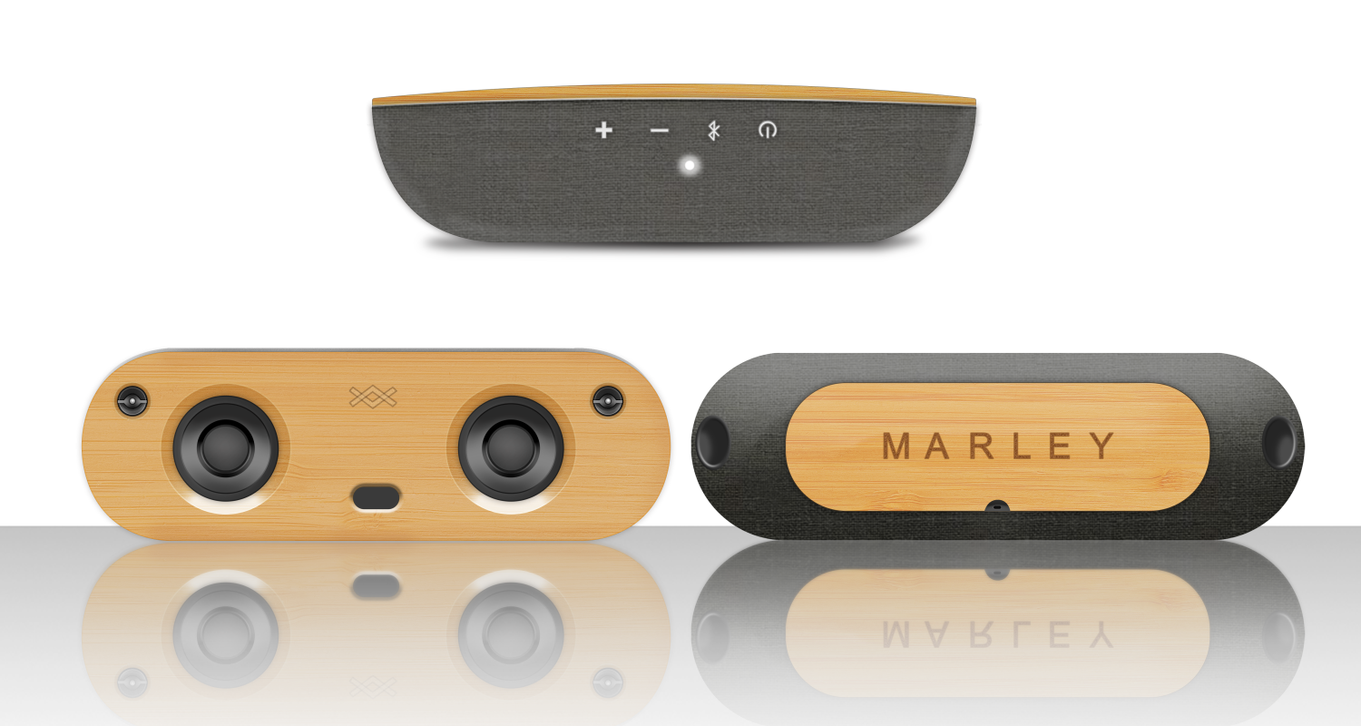 A rendering of a speaker design with three different views. Top-center, the speaker is on its side—it is a minimal, partially rounded, rectangular shape, primarily charcoal. The two views from left to right on the bottom of the speaker show two round shapes set in a woodgrain material, and the label which reads "Marley" in a modern sans-serif typeface.