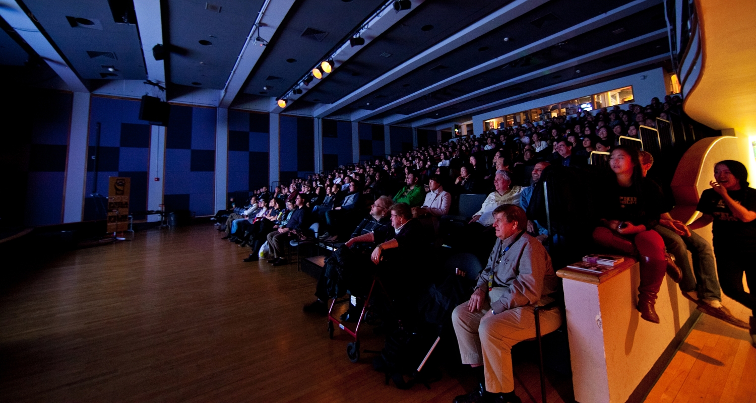 An audience watches a film in the Lightbox Film Center