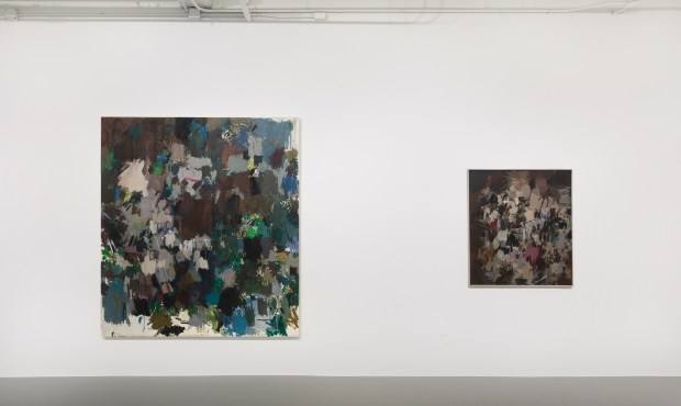 Installation view of Larry Day exhibition showing two paintings hanging side by side on a white wall; one is larger, one is smaller