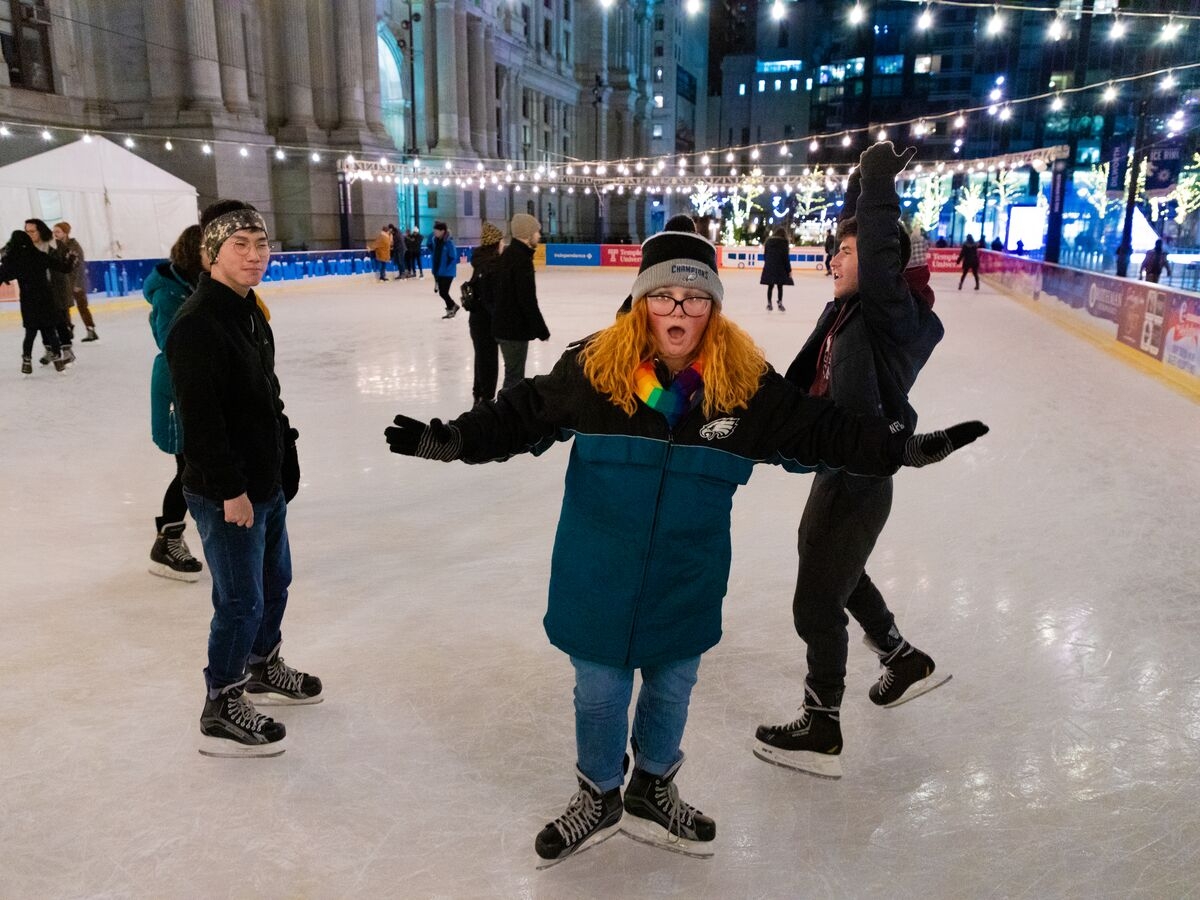Students ice skate in Dilworth Park