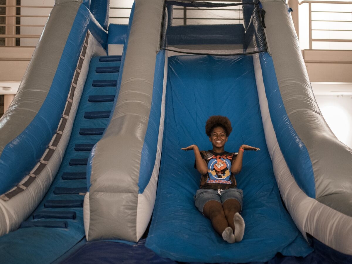 A student enjoys the bounce house during UArts Boardwalk–a carnival style evening event