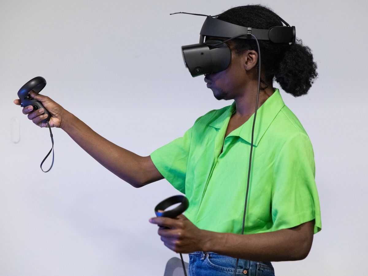 A student uses VR equipment in Professor Erik Van Horn's Art Making in VR class.