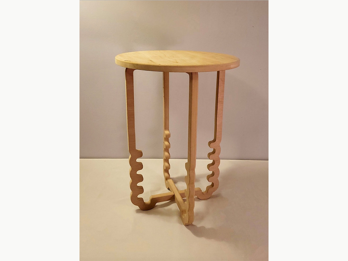 A wooden table with a round top and squiggly legs made by Gavin McCoy ’21 (Craft & Material Studies)