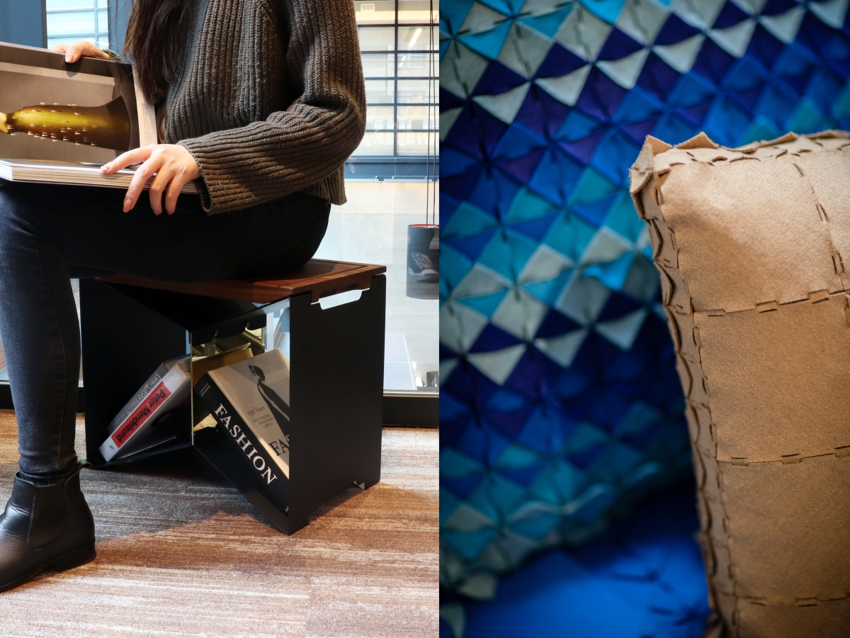A split image: a person sitting on a shelf-like stool on the left with a book in their lap. Only their legs, feet, arms and torso are visible - the image seems to focus on the stool, which has books resting inside of it. On the right, triangular patterned fabric-like surface designs appear to make up a throw blanket and a pillow. The material seems stiff. The object in the background is in various shades of blue, while the object in the front is cardboard-like in color and texture. 