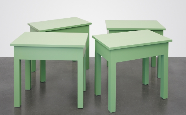 Image of four light green tables in a group