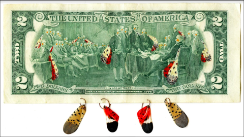 a two dollar bill edited so that a scene of the founding fathers has all of the men depicted with orange cheeks and colorful spotted lanternfly wings. From the bottom of the bill, four spotted lanternfly wings hang from rings punched into the paper.