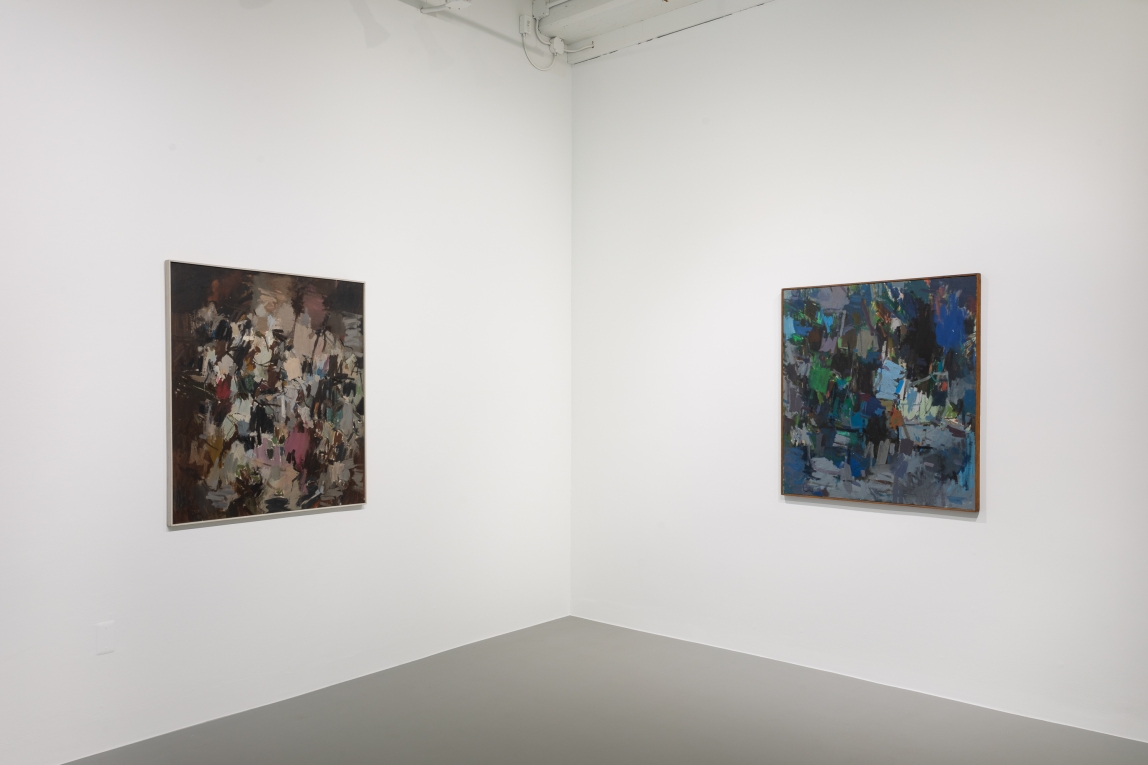 installation shot of work by Larry Day. Three abstract paintings hang on white walls in a gallery space.