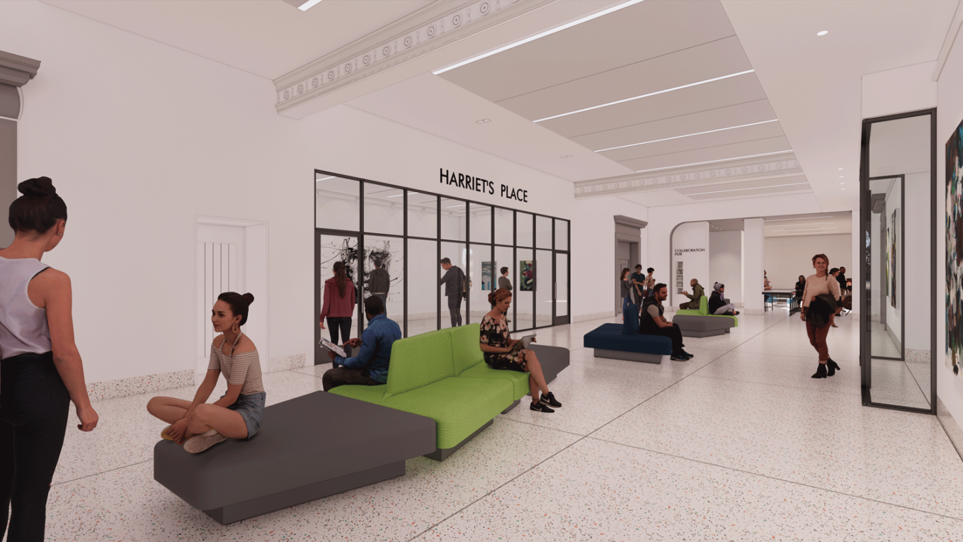 An architect's rendering. Figures and gray and lime green furniture are seated in the center of a large, open hallway with white walls and tile floors. A sign on the left-hand wall reads "Harriet's Place." Skylights or lights and decorative moulding adorn the ceiling and glass panels are visible on the left and the right. On the left, the panels seem to lead to a gallery-like space.