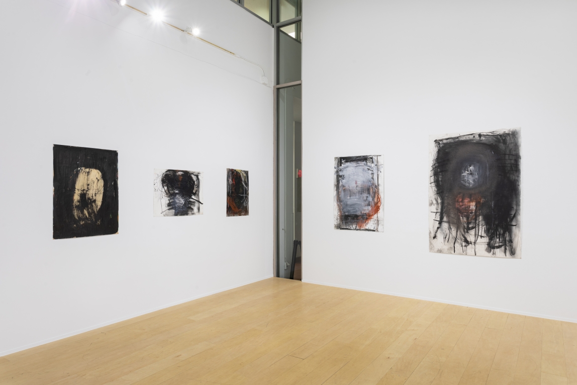Installation view of gallery with three drawings on left wall and two on the right adjoining wall