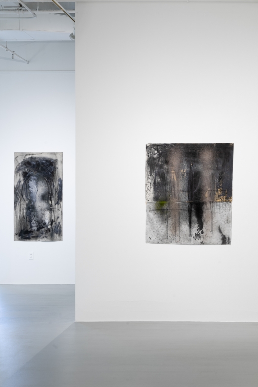 Installation view of two drawings on two parallel walls