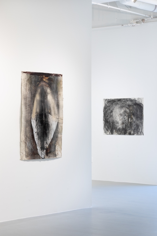 Installation view of two drawings on two different walls