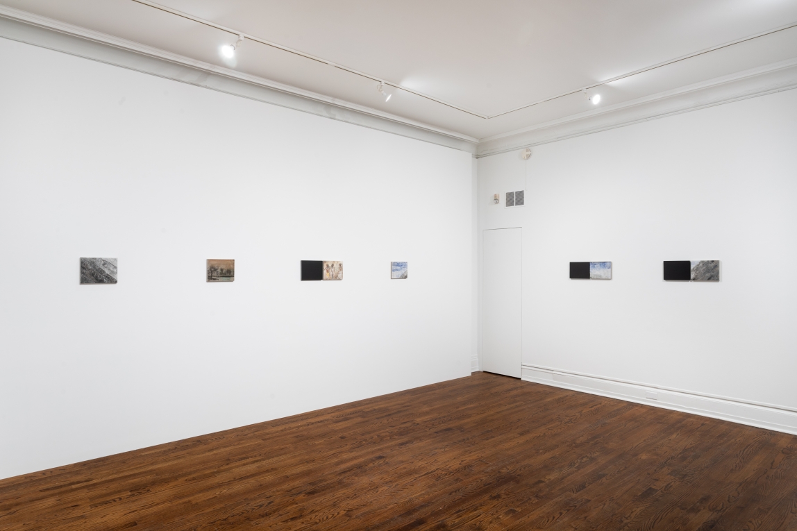 Installation view of a series of works lined up across two walls