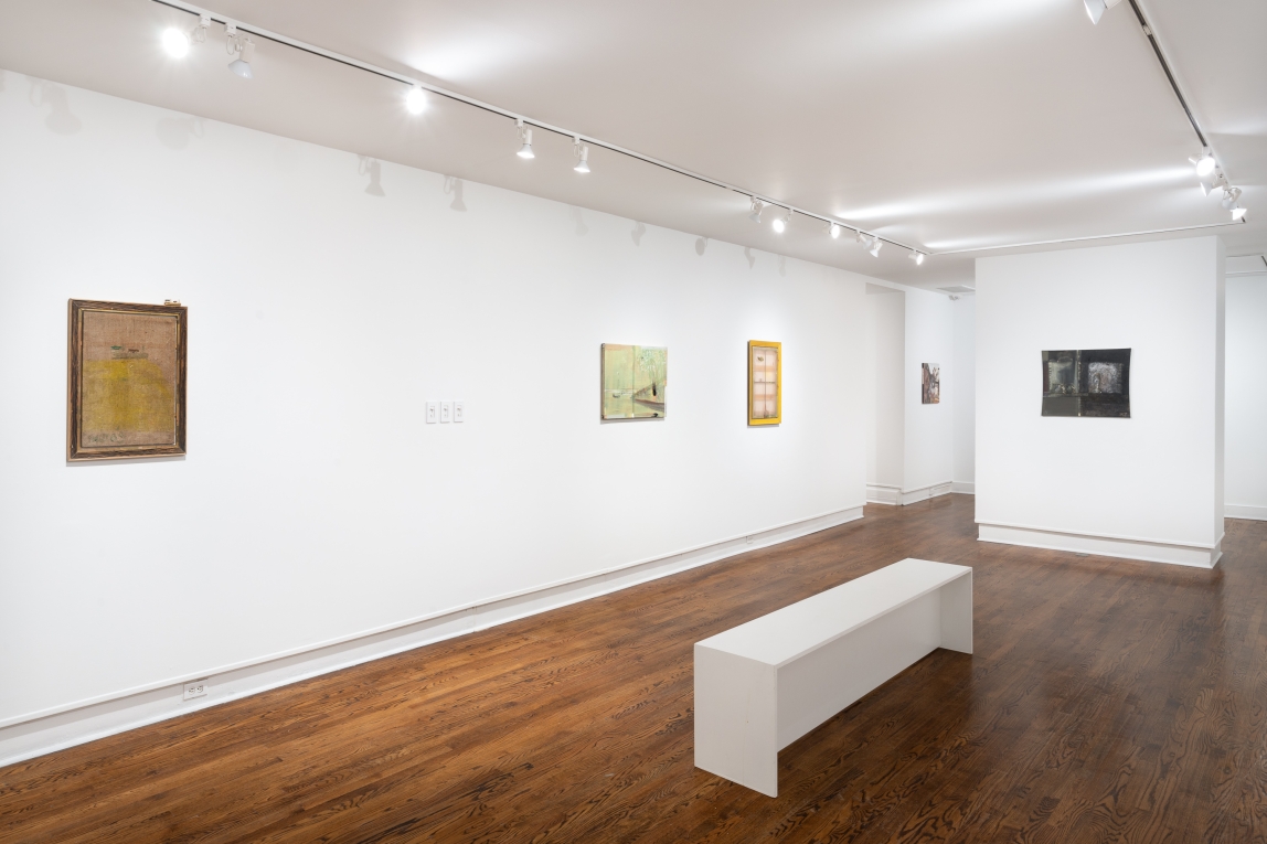 Installation image of paintings across two galleries
