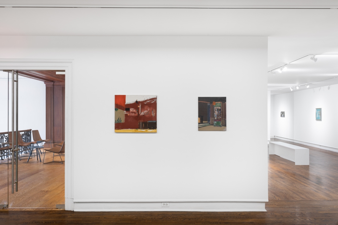 Installation view of two paintings on a wall in foreground and other galleries in background
