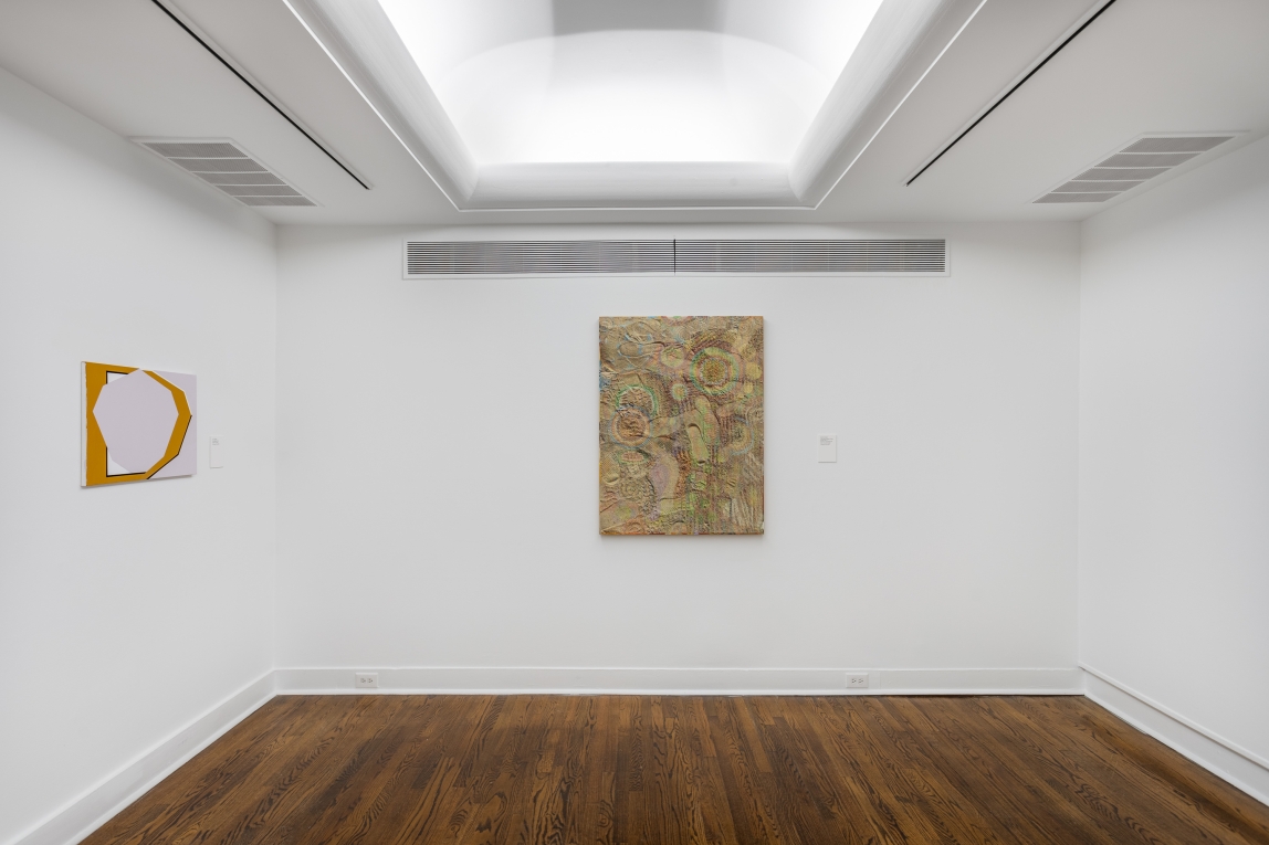 Installation view of mixed media painting and an abstract painting on adjoining walls