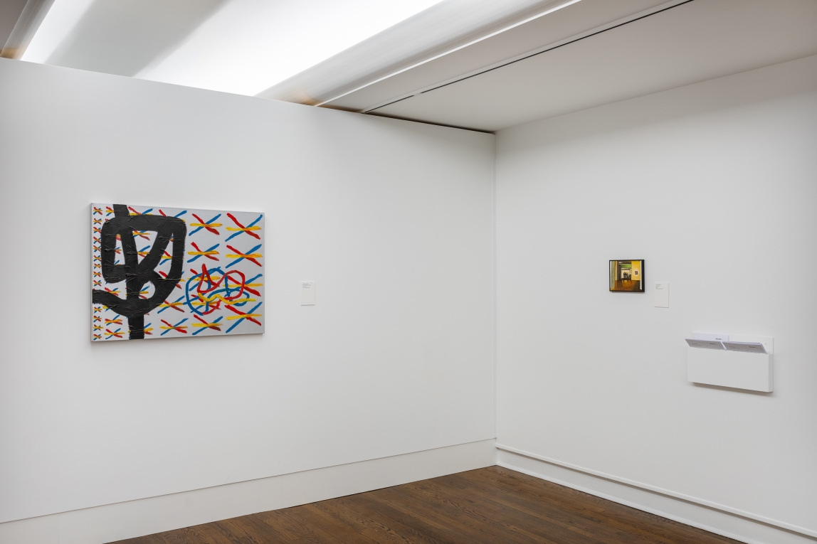 Installation view of silver painting and a small figurative painting on adjoining wall