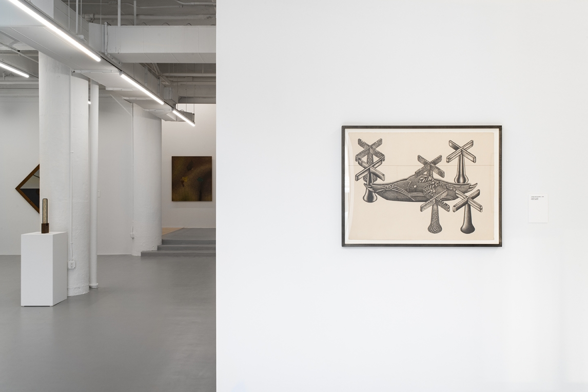 Installation image of black etching in foreground and rest of gallery in background