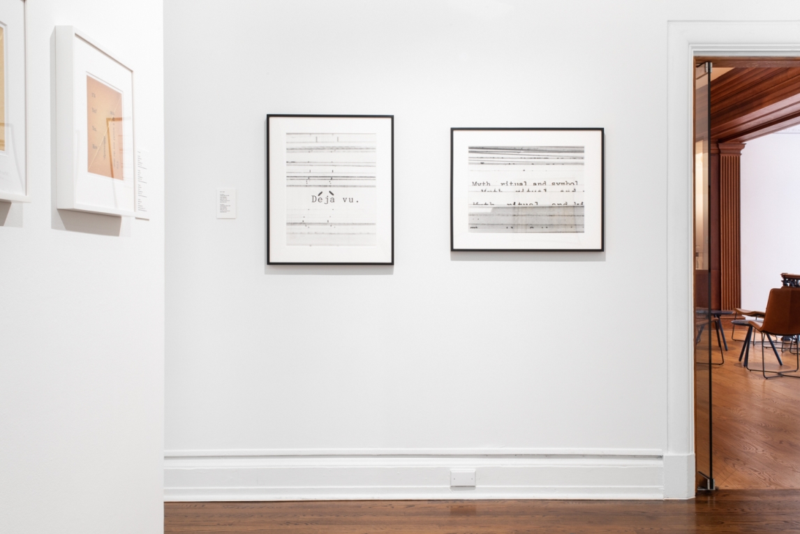 Installation view of two works showing consisting of words and text