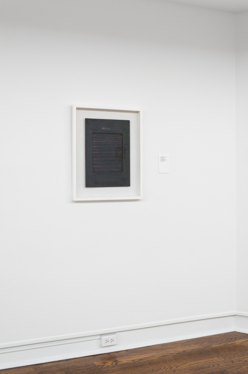Installation view of artwork with lines and text