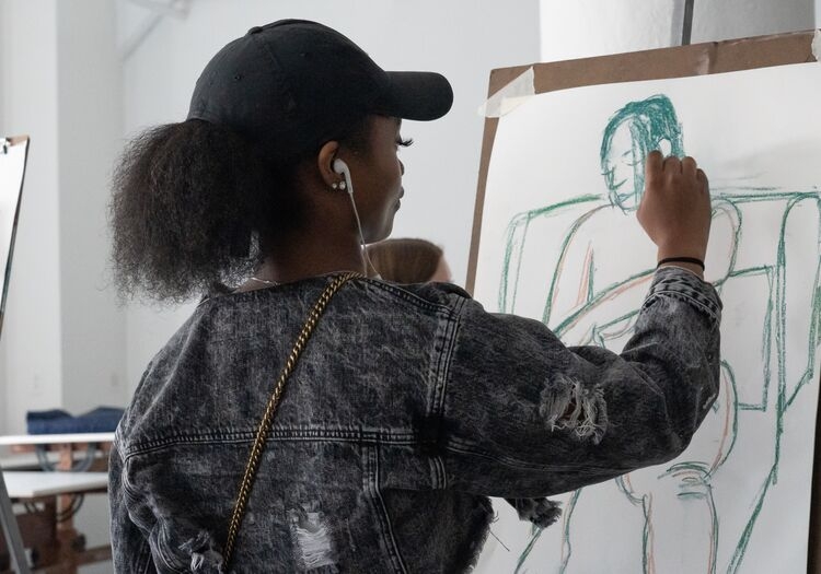Student working on a drawling in the studio 