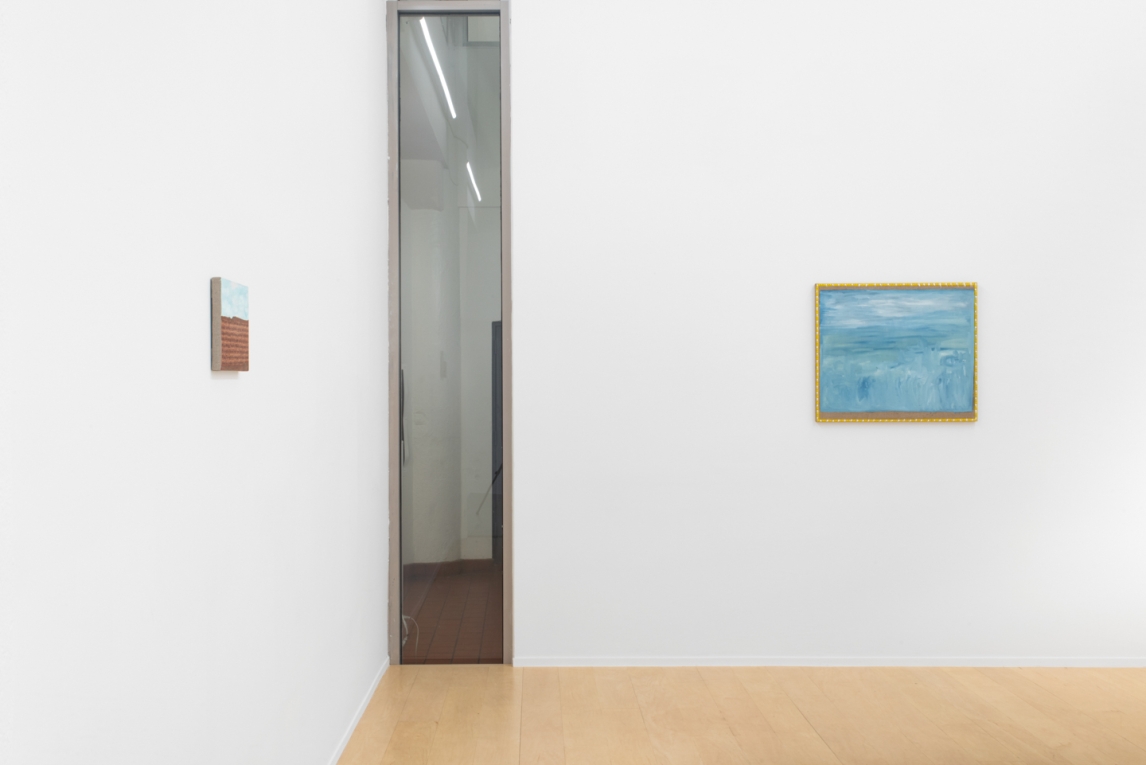 Installation view of two paintings on two different walls