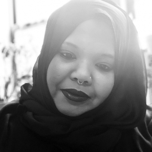 Headshot of Kameelah Rasheed in Black and White