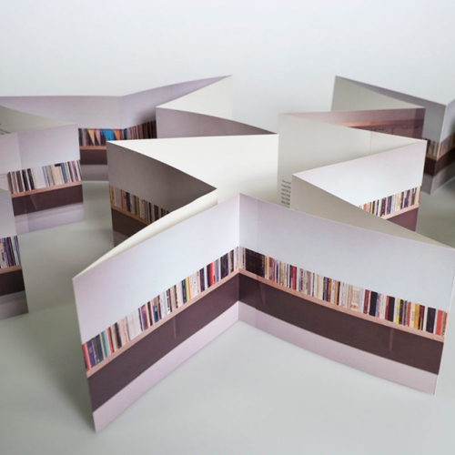 An accordion-fold book seen from above