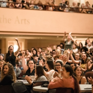 Students cheer during New Student Orientation