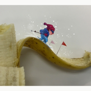 Beatrice Woodward '23, Shadow Play of a person skiing down a banana peel