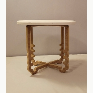A wooden end table with squiggly legs made by Gavin McCoy '21 (Craft & Material Studies)