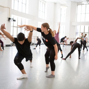 Dancers work on movement in the studio